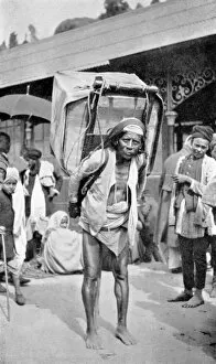 Burlington Smith Gallery: A labourer carrying tea, Darjeeling, West Bengal, India, c1910