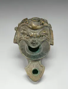 Enslaved Person Prints: Lamp in the Form of a Comic Mask, A.D. 75-125. Creator: Unknown