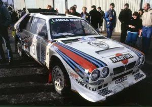 1986 Prints: Lancia Delta S4, Markku Alen at Parc Ferme 1986 R. A. C. Rally. Creator: Unknown