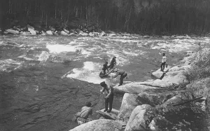 Russian Federation Prints: A Land-Management Expedition Boat Passing a Mrassu River Rapids, 1913. Creator: GI Ivanov