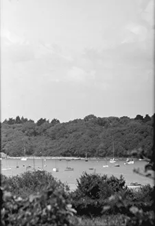 Landscape with boats, c1935. Creator: Kirk & Sons of Cowes