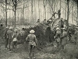 W Stanley Macbean Knight Prints: A Landship Bringing in Under Camouflage a 5. 9 German Naval Gun, (1919). Creator: Unknown