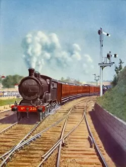 Leaving Dublin. Great Southern Railways train, hauled by a 4-4-0 passenger express, 1935