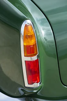 Sports Car Prints: Left tail lights of a 1961 Aston Martin DB4 GT previously owned by Donald Campbell