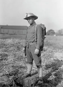 Puttee Prints: Leonard D.Mahon with Steel Helmet He Invented That Could Be Used As Shovel