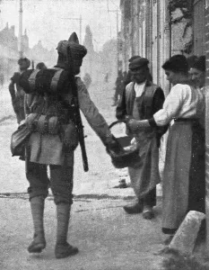 Generosity Prints: Les Hindous acceptent volontiers les presents de la population, 1914. Creator: Unknown