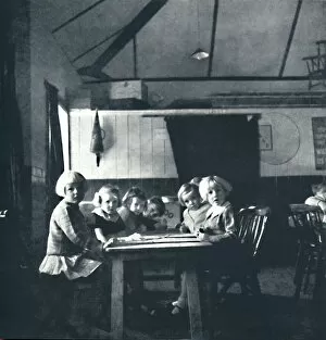 Lessons for London children in the village hall, 1941. Artist: Cecil Beaton