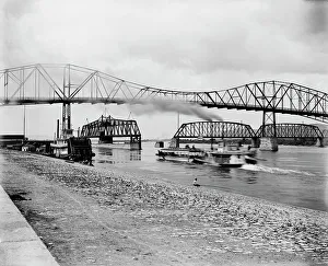 River Mississippi Prints: Levee below the bridge, The, between 1880 and 1899. Creator: Unknown
