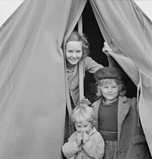 Tent City Collection: Lighthearted kids in Merrill FSA camp, Klamath County, Oregon, 1939. Creator: Dorothea Lange