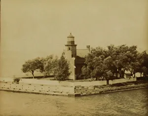 Lighthouse at end of ship canal, St. Clair Lake... near Bayfield, Wisconsin, 1903. Creator: Frances Benjamin Johnston