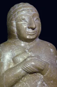 Votive Figure Prints: Detail of a limestone statue of a woman
