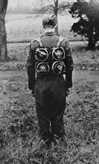 Research Prints: Limpet mines being carried on a harness on the back of a soldier