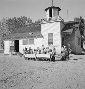 Lincoln Bench School and yard, near Ontario, Malheur County, Oregon, 1939. Creator: Dorothea Lange