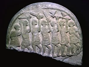 The Lindisfarne Stone showing warriors who may be vikings, Holy Island, Northumbria