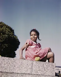 Little girl in a park near Union Station, Washington, D. C. ca. 1943. Creator: Unknown