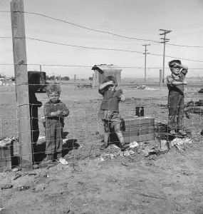 Displaced Person Gallery: Living conditions for migratory children...during pea harvest, Outskirts of Calipatria, CA, 1939