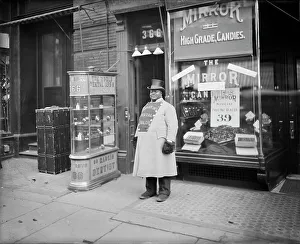 Shop Window Prints: A Living sign on Fifth Avenue, New York City, between 1900 and 1910. Creator: Unknown