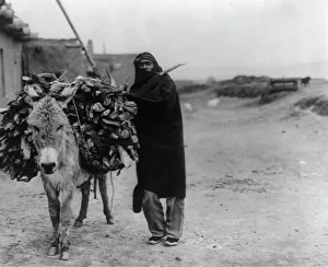 Subsistence Prints: A load of fuel-Zuni, c1903. Creator: Edward Sheriff Curtis