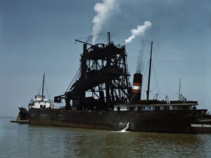 Wharf Gallery: Loading coal into a freighter at one of the Pennsylvania Railroad docks, Sandusky, Ohio, 1943