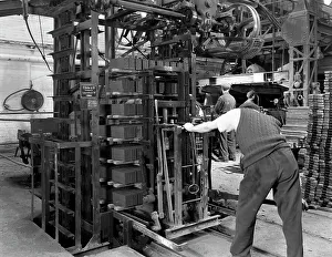 Leicestershire Prints: Loading a palletising machine with bricks