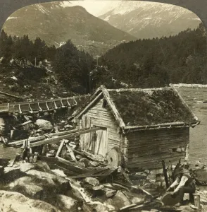 Grindstone Prints: A log-built mill and a water-wheel grindstone, on Stalheims river, Naerodal, Norway, c1905