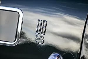 Logo Gallery: Logo on a 1965 Aston Martin DB5. Creator: Unknown