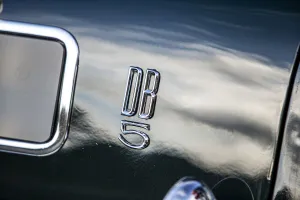 Logo Gallery: Logo on a 1965 Aston Martin DB5. Creator: Unknown