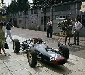 Pits Prints: Lola Coventry Climax, Chris Amon being filmed 1963 German grand Prix. Creator: Unknown