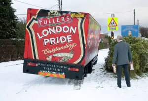 Dangerous Driving Conditions Prints: London Pride Brewery lorry stuck in snow 2009