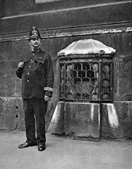 The London Stone in the wall of St Swithins, Cannon Street, London, 1926-1927. Artist: McLeish The London Stone in the wall of St Swithins, Cannon Street, London, 1926-1927. Artist: McLeish