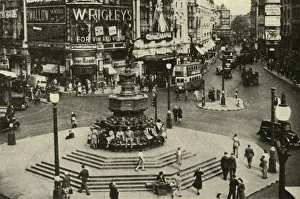 Road Junction Prints: One of Londons best-loved statues is that of Eros which surmounts the fountain