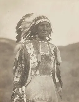 Sioux Prints: Long Dog (Shumka Hauska), 1907. Creator: Edward Sheriff Curtis