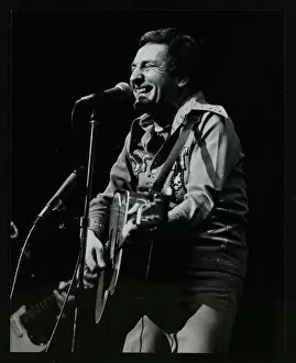 Guitar Gallery: Lonnie Donegan on stage at the Forum Theatre, Hatfield, Hertfordshire, April 1979