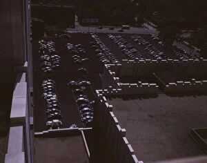 Looking down on a parking lot from the rear of the Fisher Building, Detroit, Mich. 1942. Creator: Arthur S Siegel