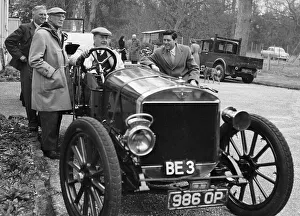 Aviator Prints: Lord Brabazon in the driver's seat of a vintage car, 1956