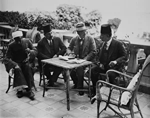 Discussion Prints: Lord Carnarvon with Egyptian officials, Luxor, Egypt, 1922. Artist: Harry Burton