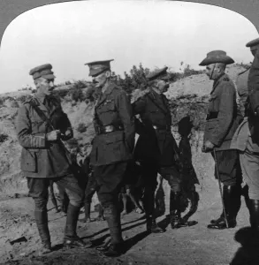 Lord Kichener reviews the situation at Gallipolli with ANZAC officers, World War I, 1915-1916. Artist: Realistic Travels Publishers