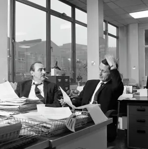 Administration Gallery: Lost order? two salesmen try to sort out the orders over a cigarette, 1967. Artist