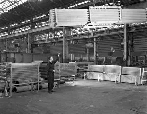 Lowering Gallery: Lowering galvanised heat exchangers, Edgar Allen Steel Co, Sheffield, South Yorkshire, 1964