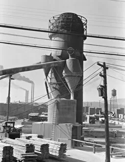 Timber Gallery: Lumber burner and stacks of the Big Lakes Lumber Company... Klamath Falls, Oregon, 1939