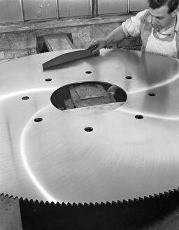 Circular Saw Gallery: A machinist quality checking a six foot circular saw blade, Sheffield, South Yorkshire, 1963