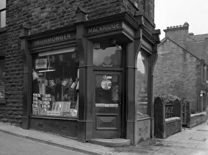 Retail Gallery: Mackridges ironmongers shop, Wombwell, South Yorkshire, 1962. Artist: Michael Walters