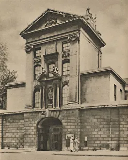 Hospital Prints: Main Gate of St. Bartholomews, Londons Eldest Hospital, c1935. Creator: Donald McLeish