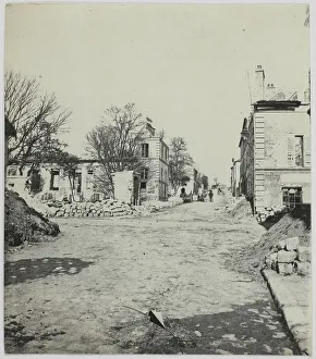 High Street Prints: Main street of Champigny, Champigny-sur-Marne, 1871. Creator: Hippolyte Blancard