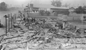Aftermath Prints: Main Street Fire Damage, Toogoolawah, Queensland, 1926. Creator: Jack Bain
