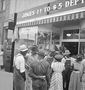 Shoes Collection: Main street, Saturday afternoon, Pittsboro, North Carolina, 1939. Creator: Dorothea Lange