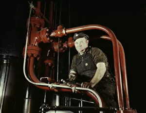 Combustion Engineering Corporation Gallery: Maintenance mechanic in largest coal press... Combustion Engineering Co. Chattanooga, Tenn. 1942