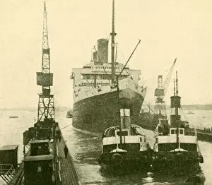 Liner Gallery: The Majestic Entering Dry Dock Hauled by Tugs, c1930. Creator: Unknown