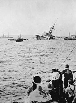 The Majestic sinking after being torpedoed by an enemy submarine, 1915