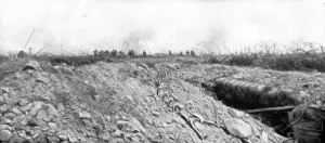 How to make a surprise attack; Crossing our network of razor wires.. 1917. Creator: Unknown